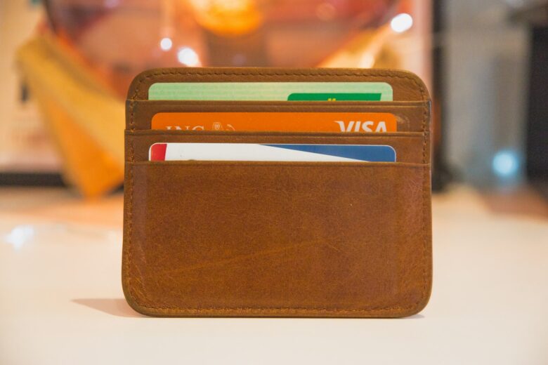 Wallet with cards, representing a small business owner managing business credit card spending