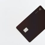 Black credit card on a white background