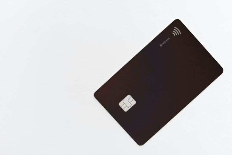 Black credit card on a white background
